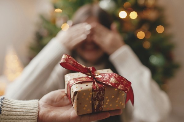 woman receiving christmas gift